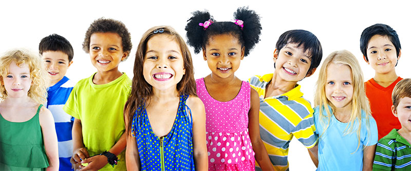 The image shows a diverse group of children with various skin tones and hairstyles, all smiling at the camera.